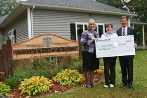 Savers Bank present donation to AYFS
