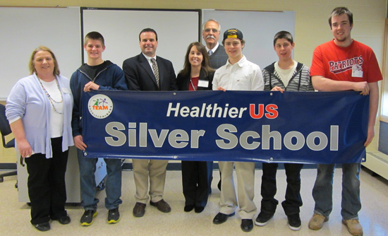 John Magnarelli, a senior official from the U.S. Department of Agriculture presents Valley Tech with the HealthierUS School Challenge Silver Award.